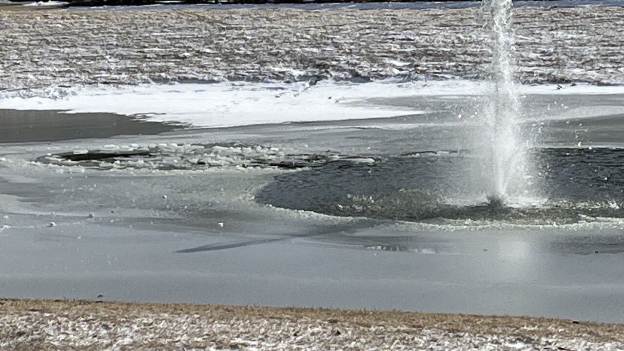 Child pulled from retention pond in Norfolk