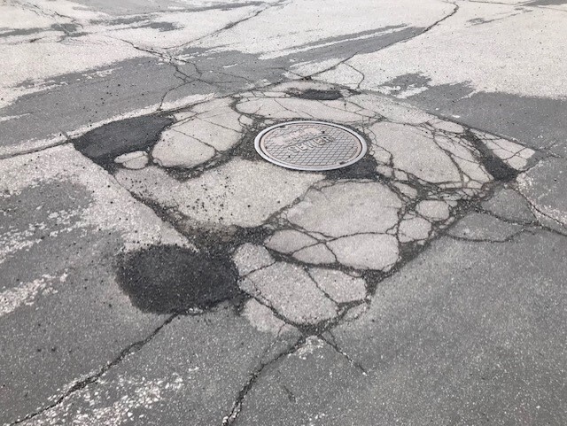 Potholes damaging cars in Milwaukee