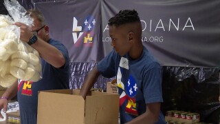 A'sa Polk helping pack boxes