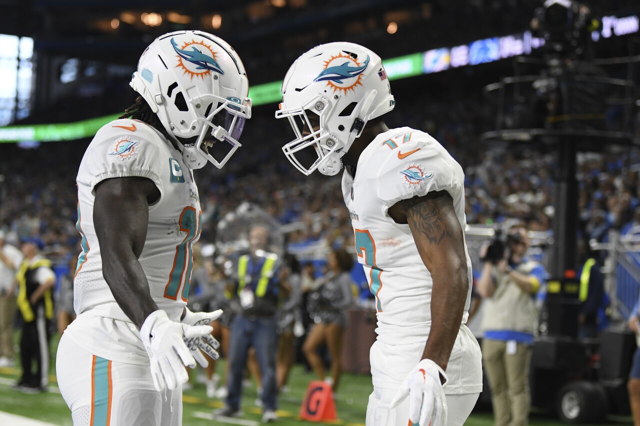 Miami Dolphins receivers greet each other after Waddle's TD at Detroit Lions, Oct. 30, 2022