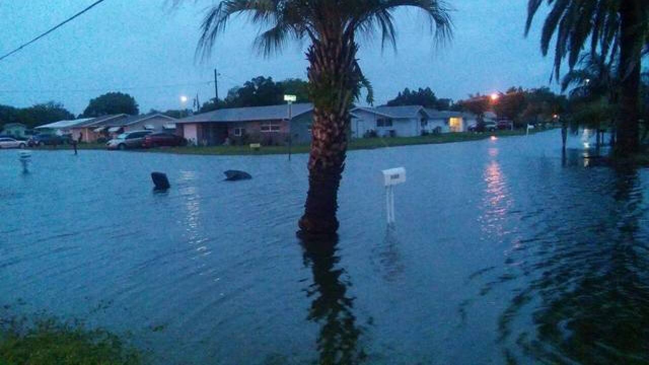 PHOTOS | Tropical system causing flooding