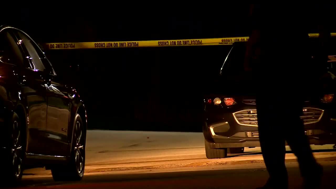 car surrounded by police tape after shooting outside downtown Marriott in West Palm Beach, July 18, 2021