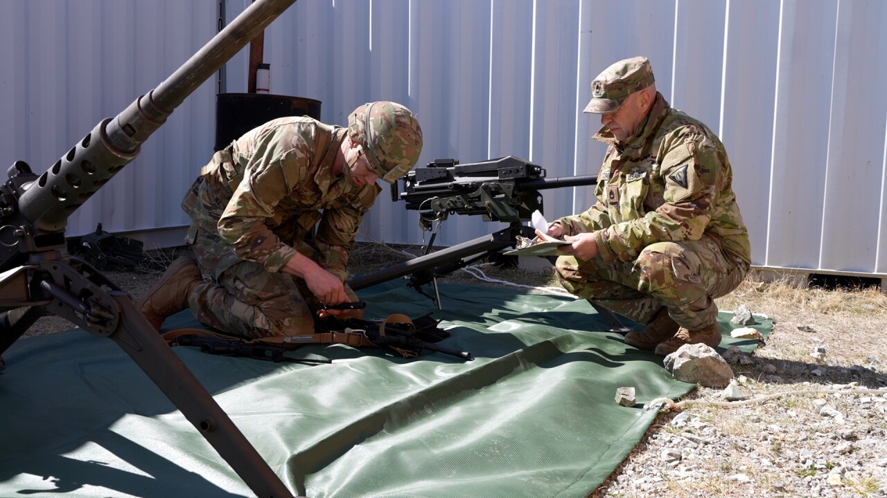 Soldier assembling gun