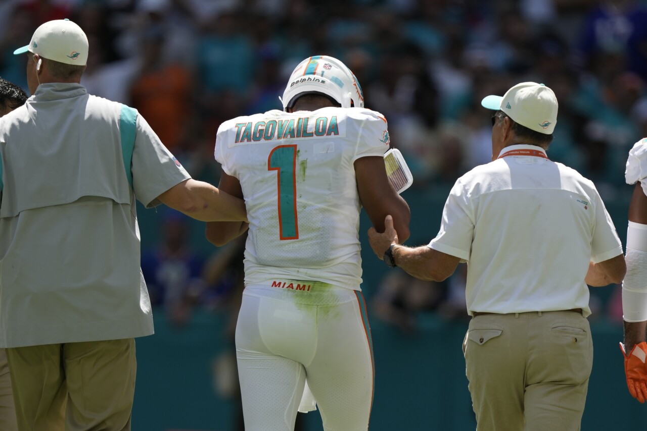 Miami Dolphins QB Tua Tagovailoa assisted off field after hit vs. Buffalo Bills, Sept. 25, 2022