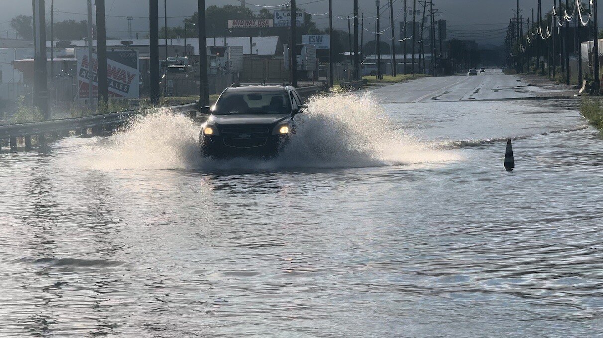 cars in flooded roadway.jpg