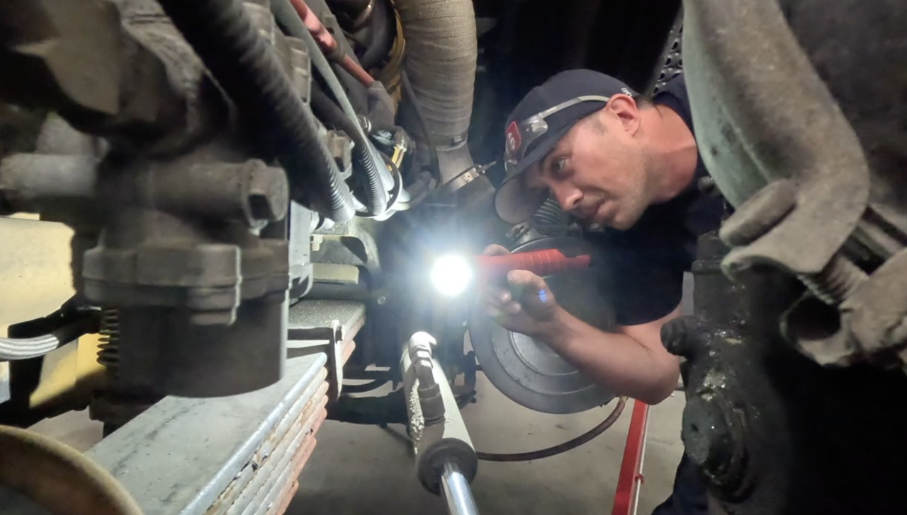 Sharonville Fire Department and EMS mechanic Ben Whittington works on a fire truck