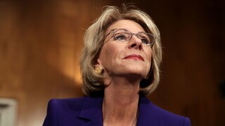 Betsy DeVos testifies during her Senate confirmation hearing.
