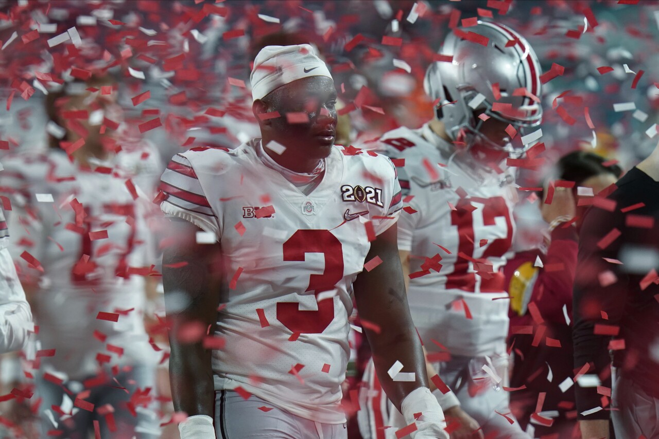 Ohio State Buckeyes walk off field after losing to Alabama Crimson Tide in 2021 College Football Playoff National Championship