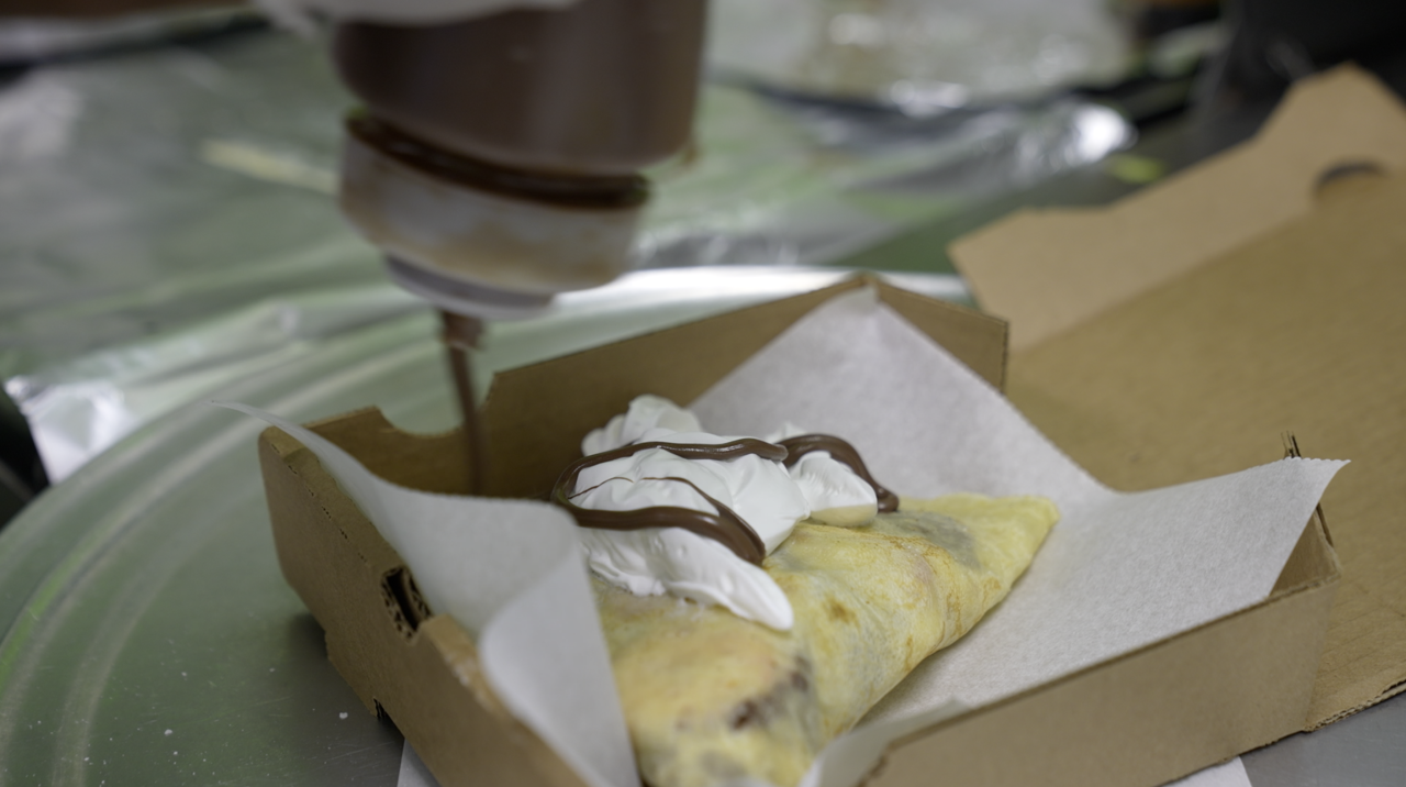 Putting the final touches on the crepe