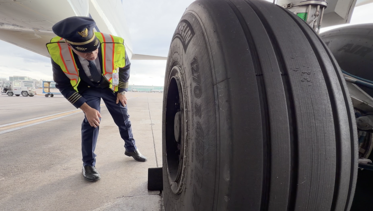 Inspecting his United Airlines Airbus