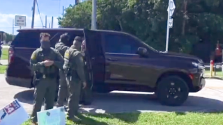 Customs and Border Patrol agents at Florida voting site