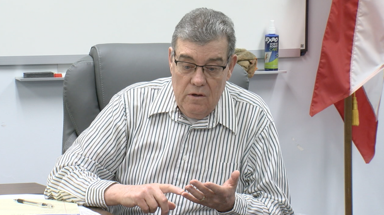 Dennis Cooper, chairman of Washington Township Board of Trustees, asks a question about Zimmer closure.