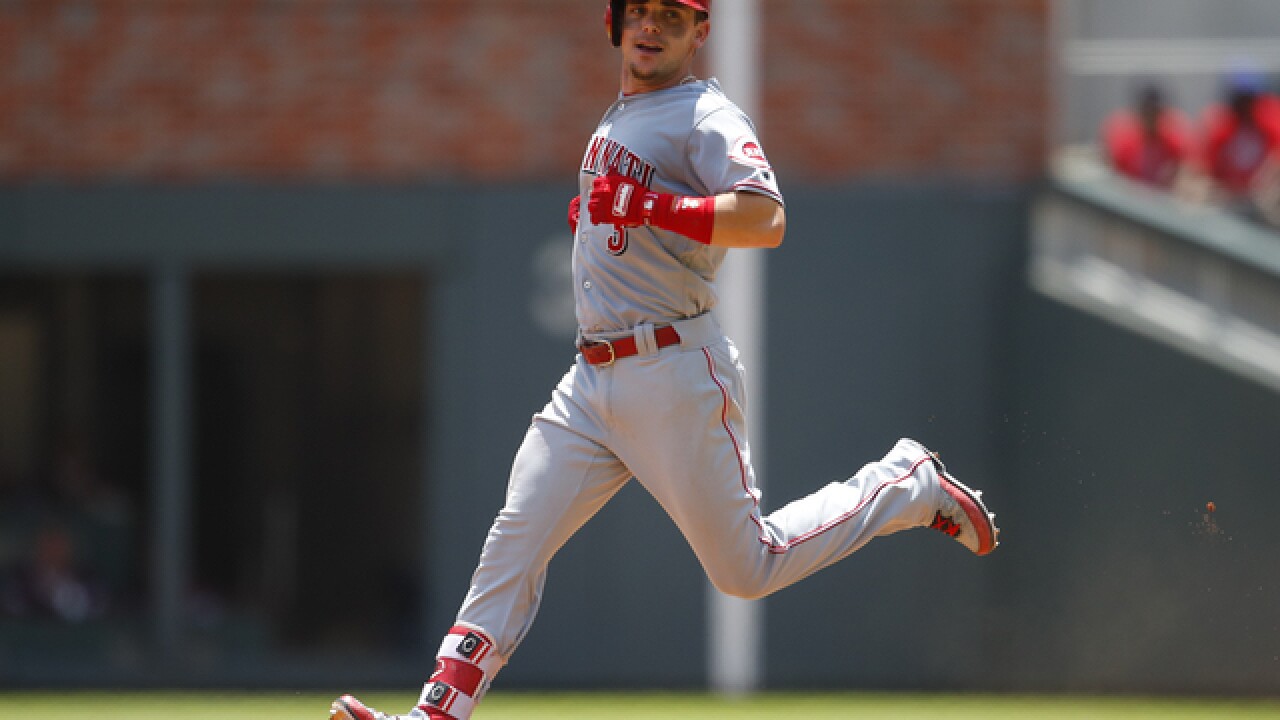 Reds stay hot with 6-5 win over Braves