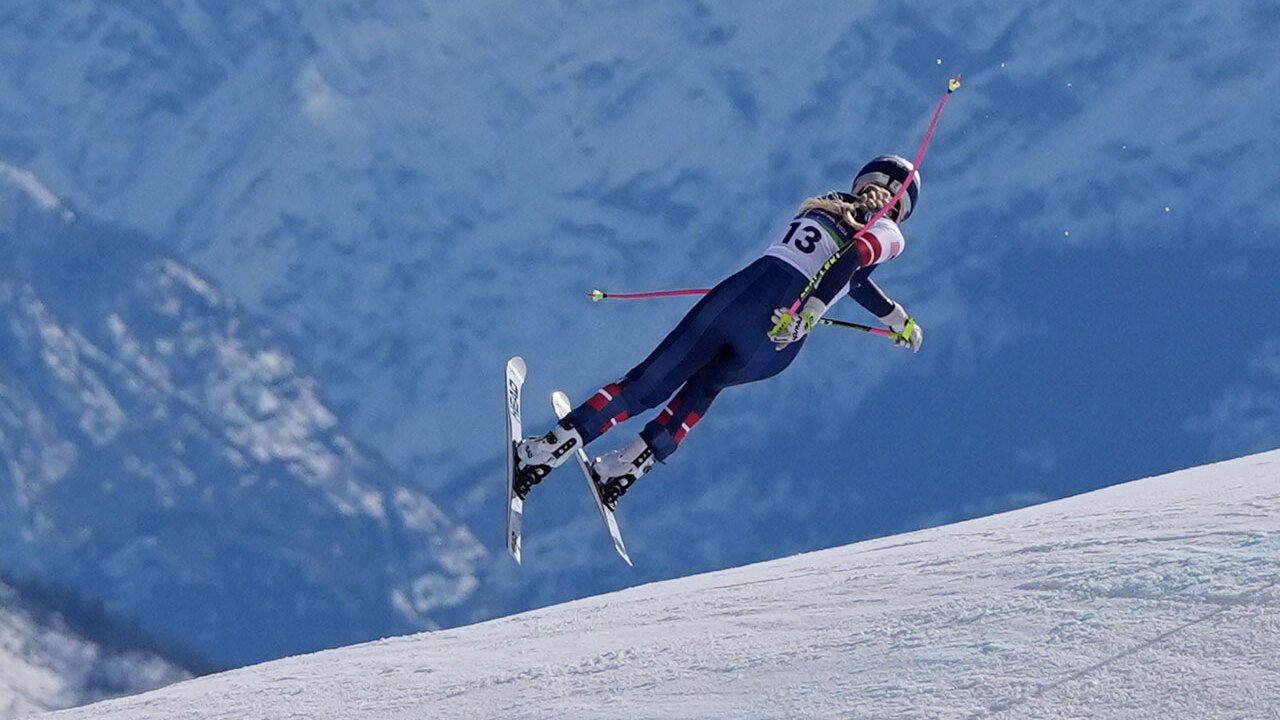 United States' Lindsey Vonn crashes during an alpine ski women's downhill race, at the 2026 Winter Olympics, in Cortina d'Ampezzo, Italy, Sunday, Feb. 8, 2026.