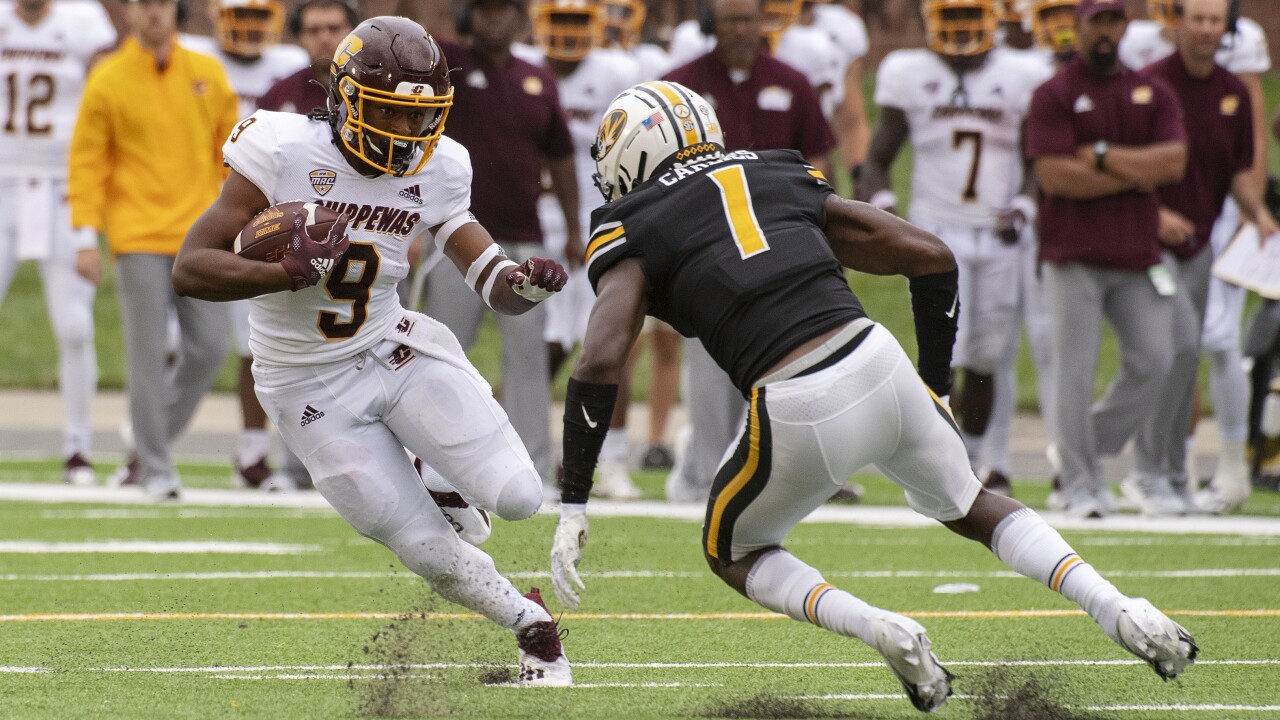 WMU keeps its bowl hopes alive rallying to beat CMU 38-28