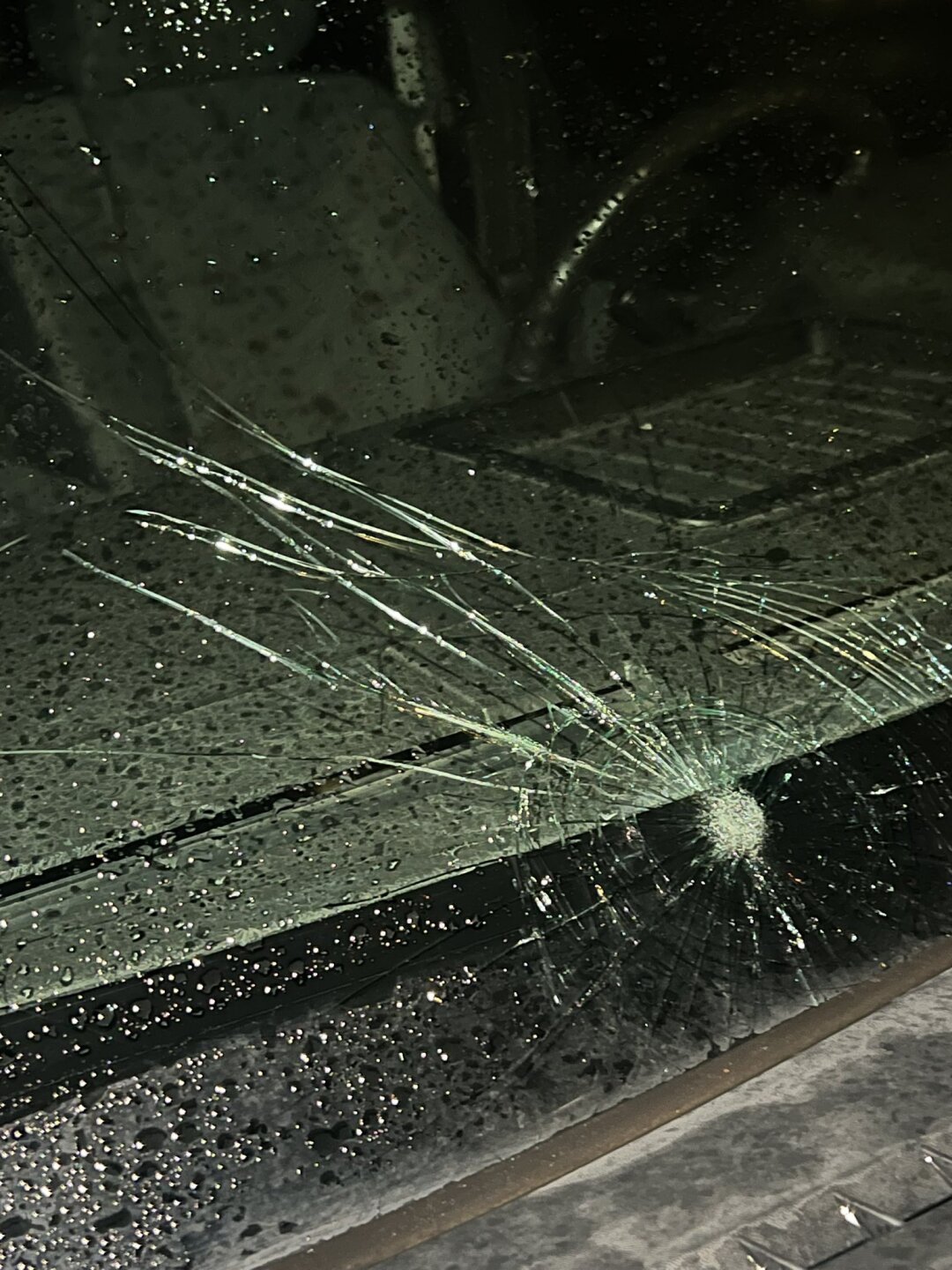 Hail damage on truck windshield
