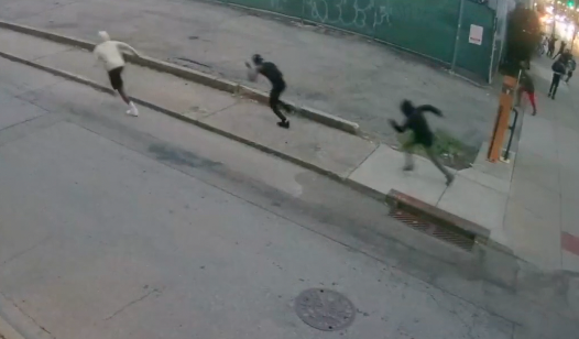 A group of teens flees gunfire near Grant Park in Over-the-Rhine on March 22, 2026.