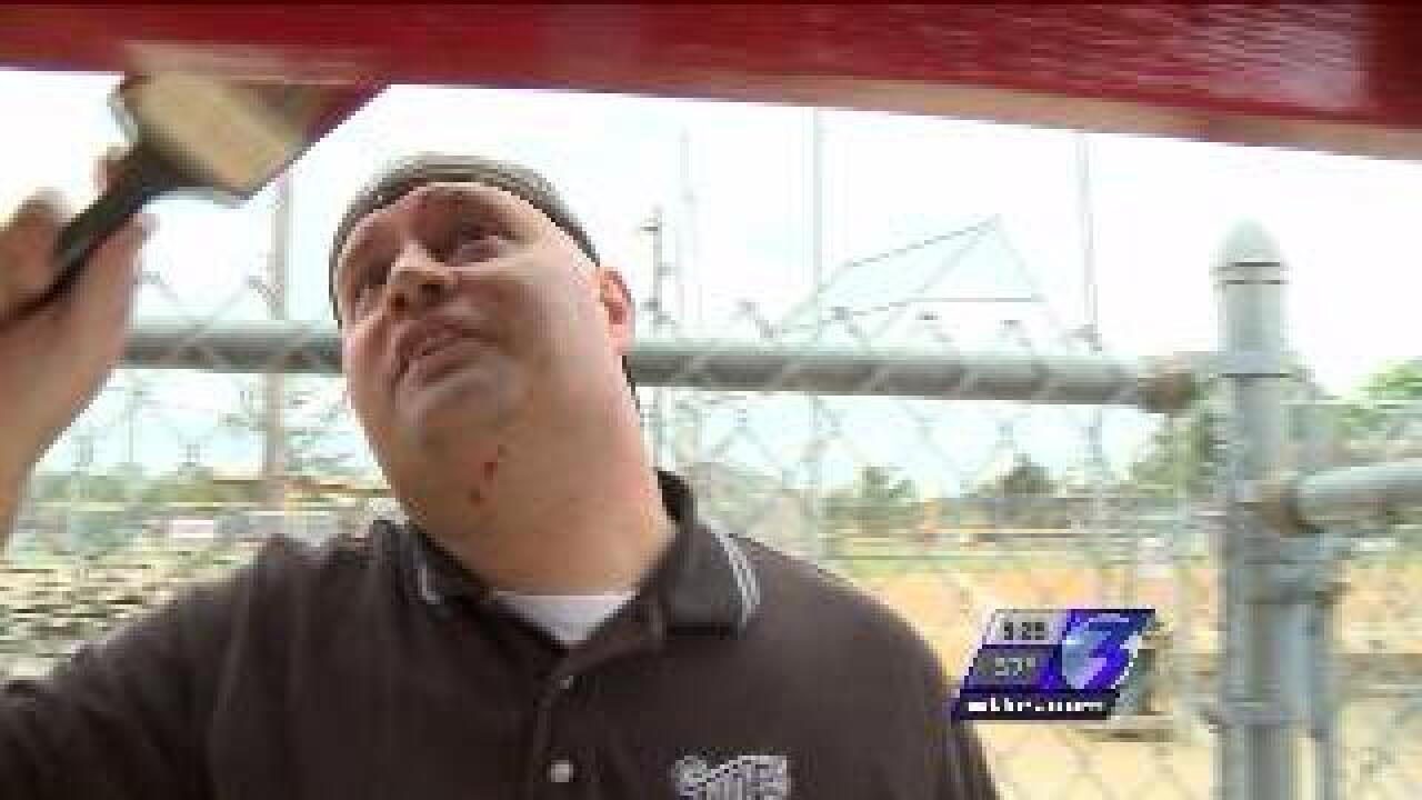 Norfolk Tides help rebuild local ball field