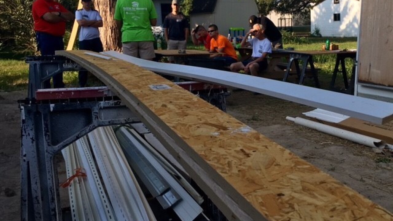 PHOTOS: Police build Habitat for Humanity home