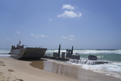 A washed up US Army vessel and a strip of docking area stranded off the coast near Ashdod, Israel.