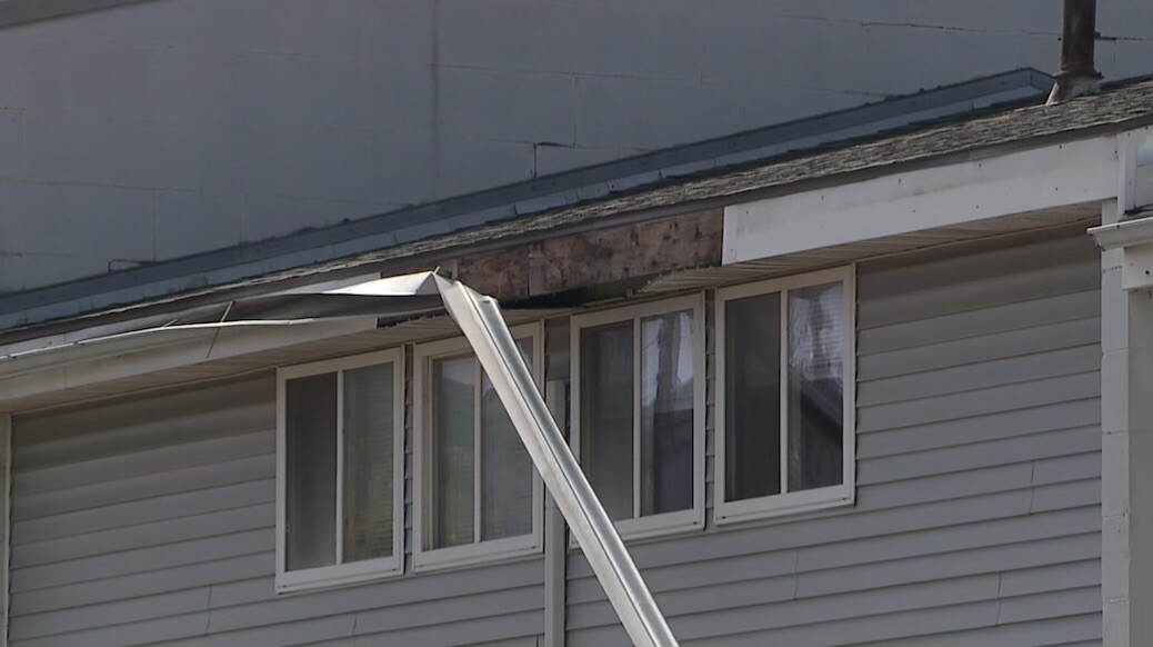 broken siding at parade park.jpeg