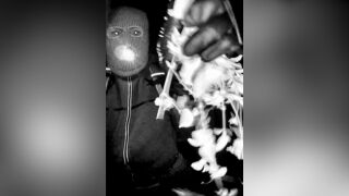 Masked individual at Nancy Guthrie's home before her disappearance. 