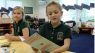Students in Jupiter write letters of comfort to children in the Bahamas