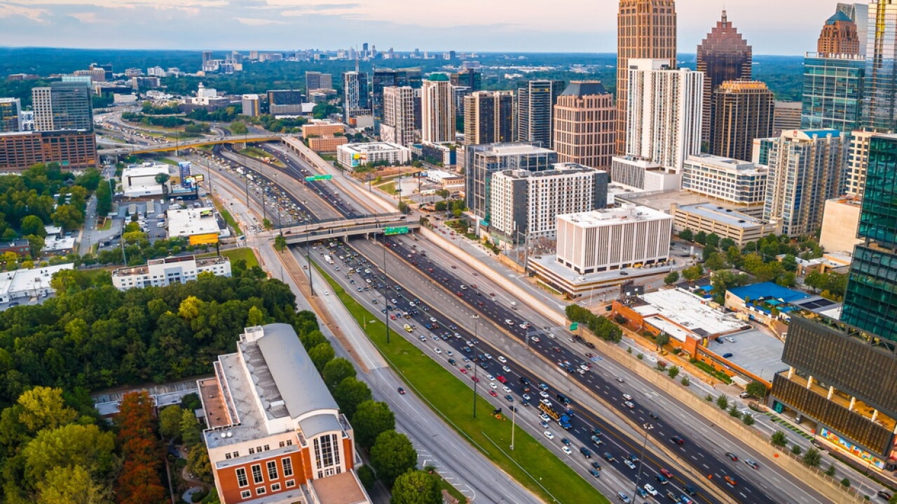 Atlanta,Skyline,And,Highway,At,Sunset,With,Midtown,Towers,And