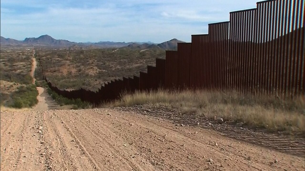 Despite big talk, Trump makes modest border wall ask