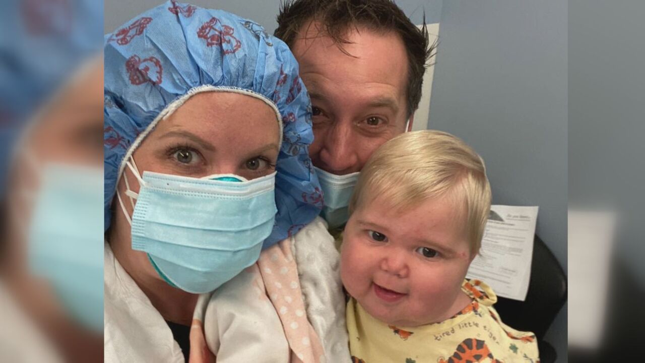 Caprie Knies with her family in the hospital
