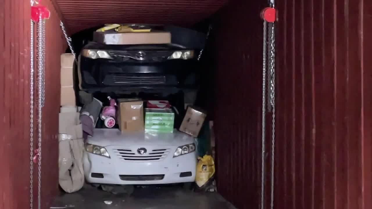 Stolen cars in shipping containers.jpg