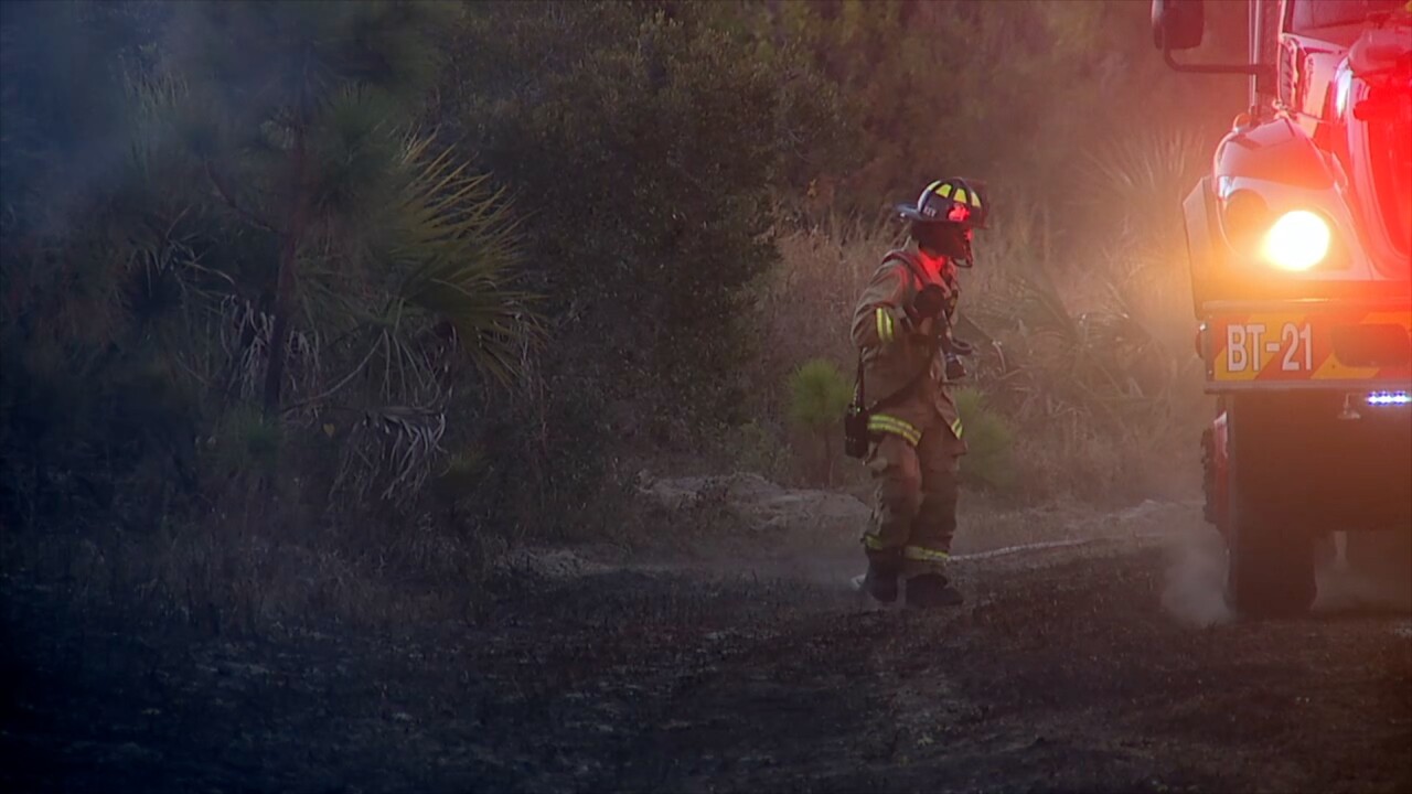 Firefighters fighting a fire in DeSoto County.
