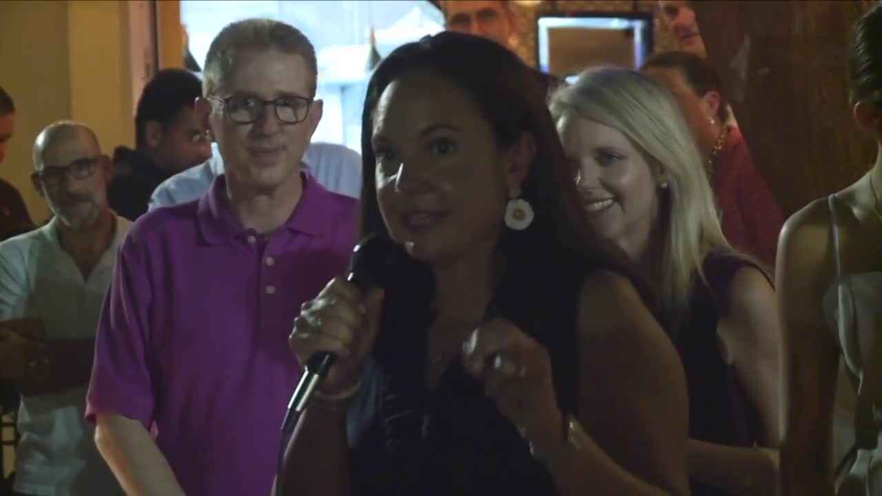 Michelle Oyola McGovern thanks supporters while Melissa McKinlay looks on, Aug. 23, 2022