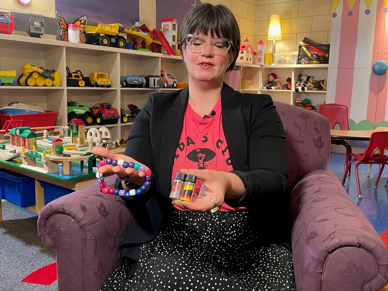 maureen with beads.jpg