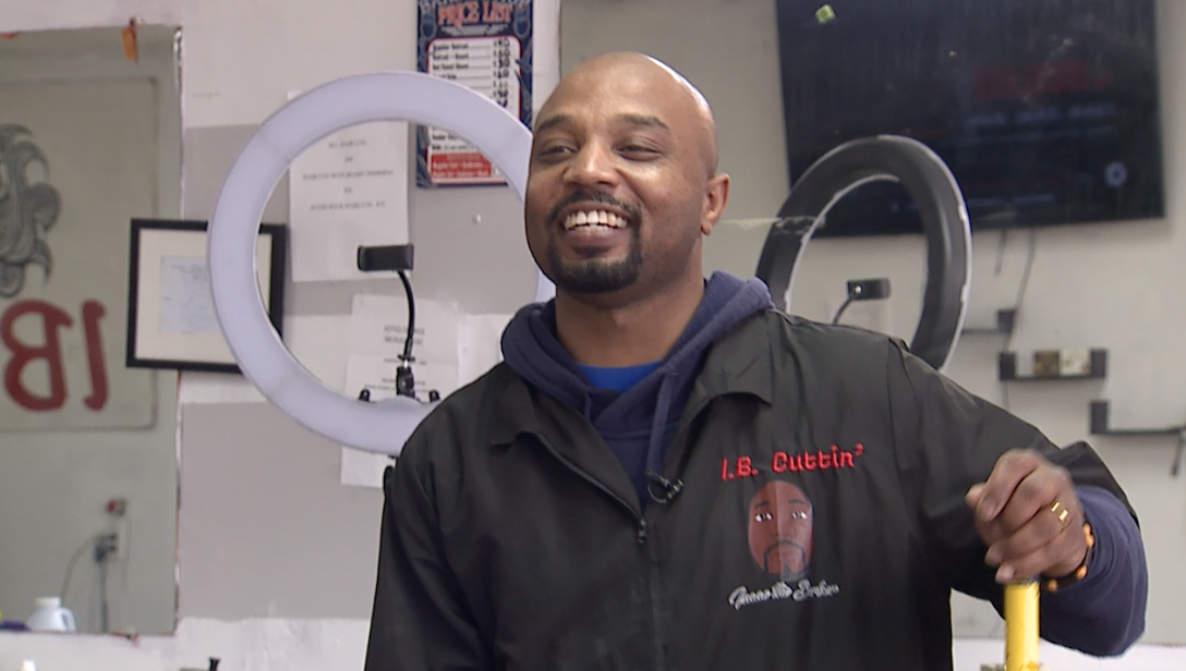 Owner of IB Cuttin Barbershop Isaac Brown says it's time the focus of city revitalization projects turn from downtown to other Detroit neighborhoods