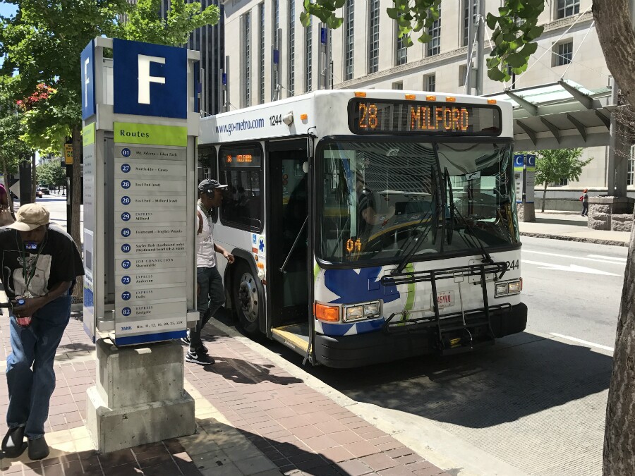 Cincinnati Metro Rt. 28 bus pulls up to its stop at Government Square, photographed July 2017.