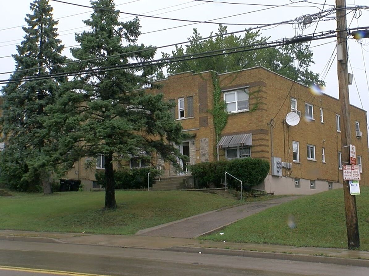 The Westwood apartment building where Valerie Lane lives. The two-story brick building contains four apartments.