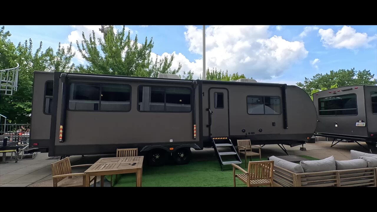 The fleet of luxury tailgating trailers next to Huntington Bank Field includes smaller units and these oversized VIP chalets.
