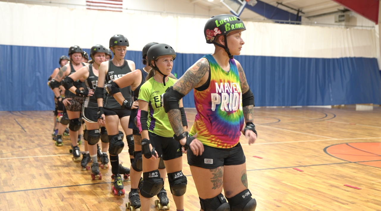 East Lansing Roller Derby team lined up for practice