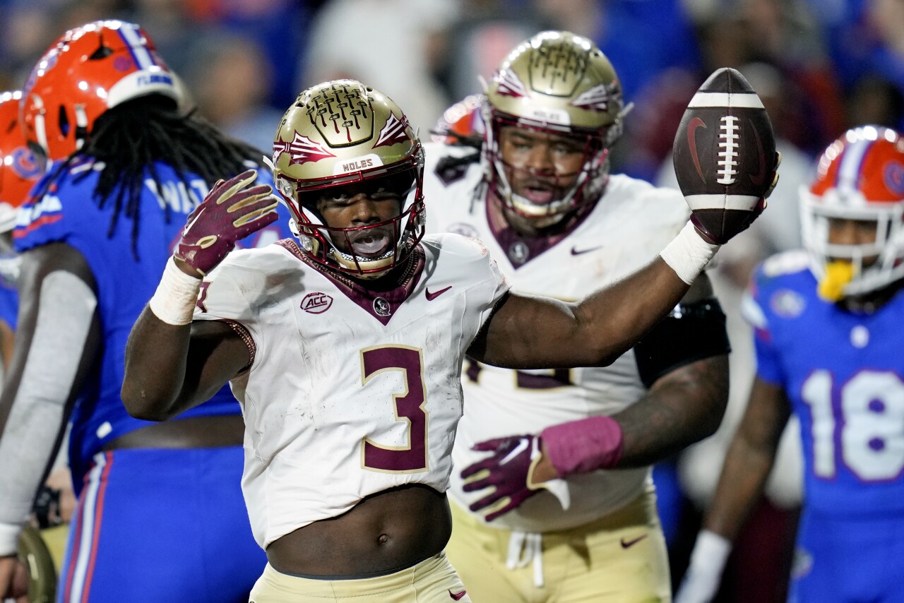 Florida State Seminoles running back Trey Benson celebrates 1-yard TD run during second quarter at Florida Gators, Nov. 25, 2023