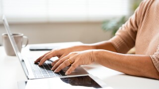 Close,Up,On,Elderly,Woman,Hands,Using,Laptop,Typing,On