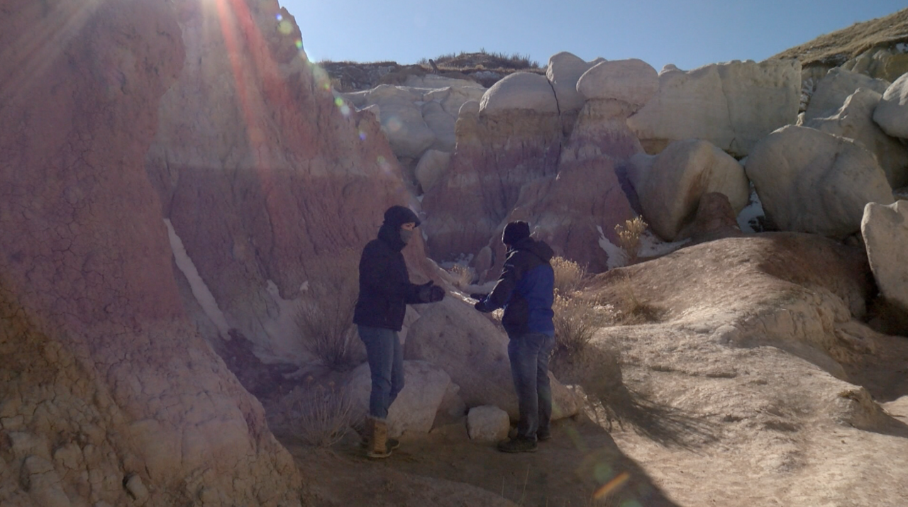 Photo of two people in the paint mines