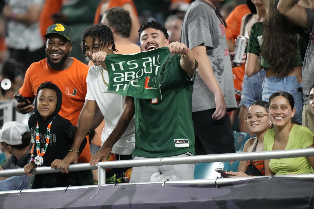 Miami Hurricanes fan waves 'It's All About The U' towel during 2023 season opener