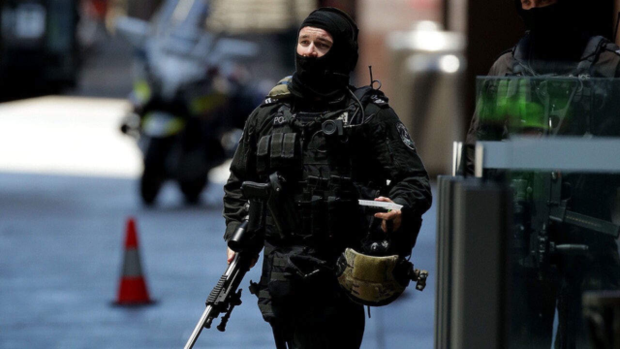 PICS: Standoff at Sydney cafe