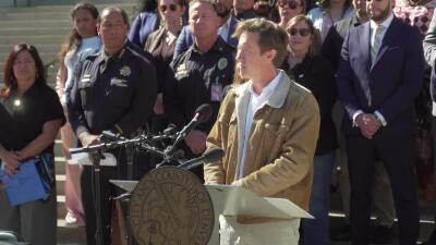 Denver Mayor Mike Johnston signs order banning ICE from city property lays out measures to protect protesters.jpg