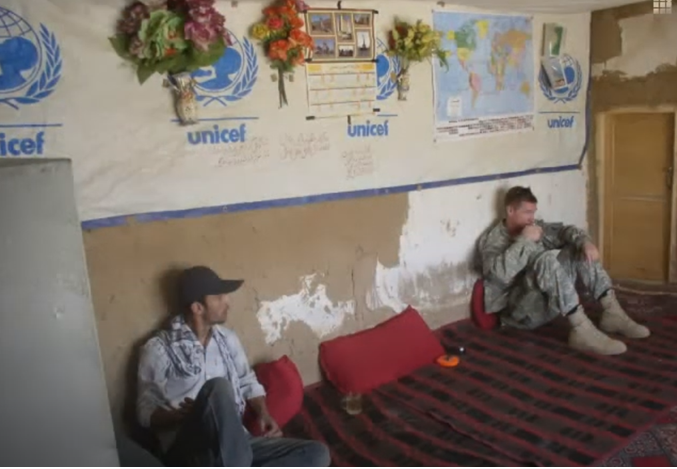 Ahmad "Kevin" Siddiqi and Scott Henkel in Afghanistan