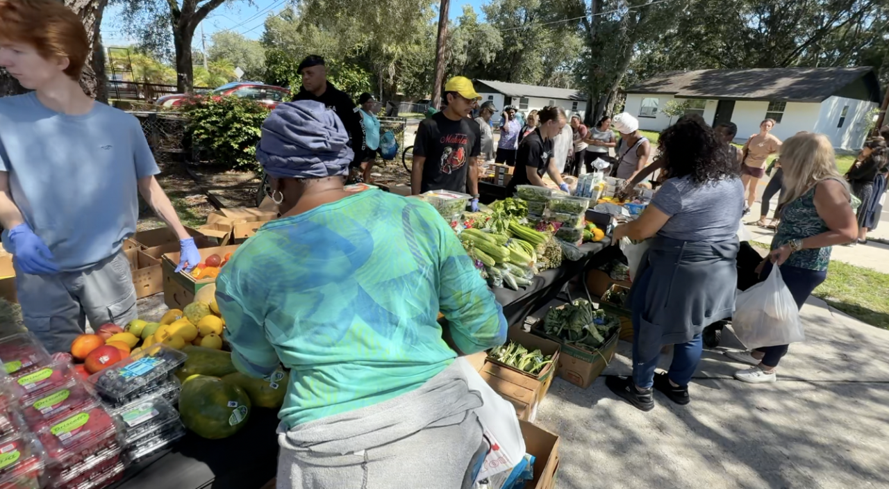 People line up at Kinship give away