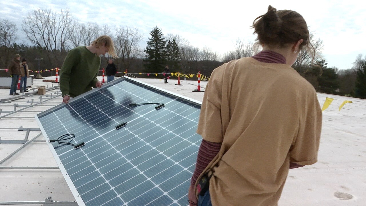 Students with panel.jpg