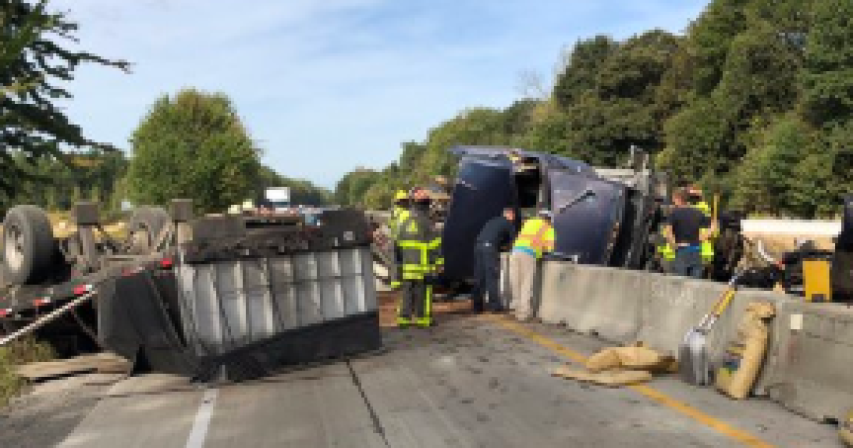 Overturned truck shuts down I 74