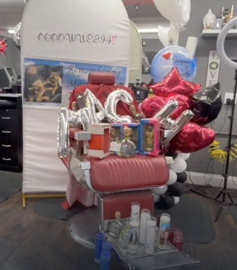 A memorial has taken over Manuel "Macho" Torres' chair at his Uppercutz Barbershop location in Port Charlotte.